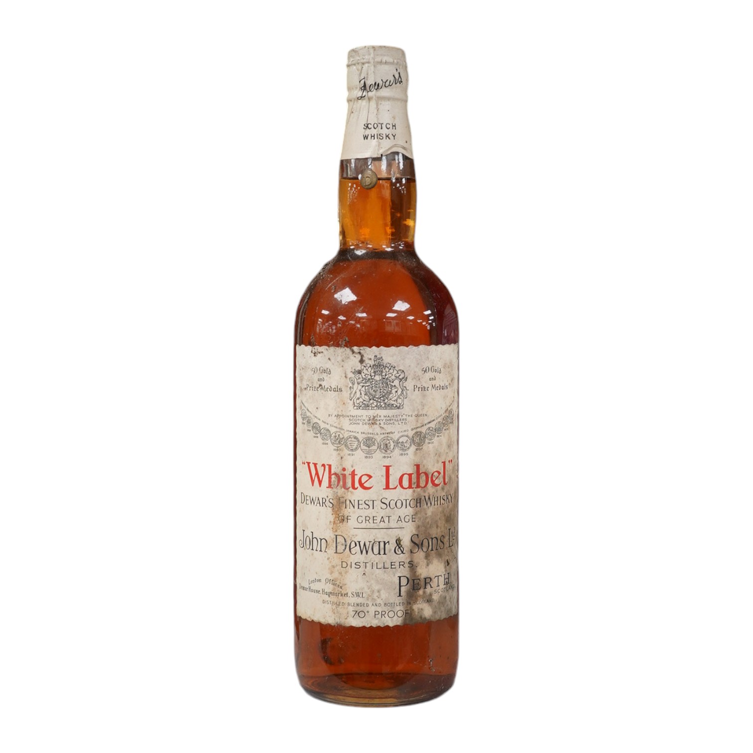 John Dewar & Sons Ltd. White Label, Finest Scotch Whisky Of Great Age, By Appointment to Her Majesty The Queen. Condition - label stained, bottle dirty, sealed